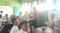 Polsek Gerung Kawal Pembagian Makan Bergizi Gratis untuk Ratusan Siswa SD di Dasan Tapen